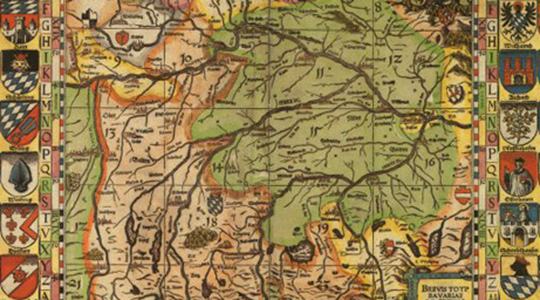 Abgebildet ist eine historische Karte von Bayern. Sie zeigt grob das Gewässernetz und Farbflächen welche die Verwaltungsgebiete darstellen.